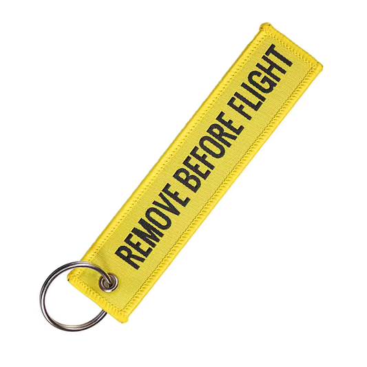 Gele Remove Before Flight Sleutelhanger – hoofdafbeelding