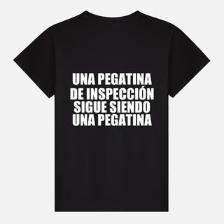 Una pegatina de inspección sigue siendo una pegatina T-shirt